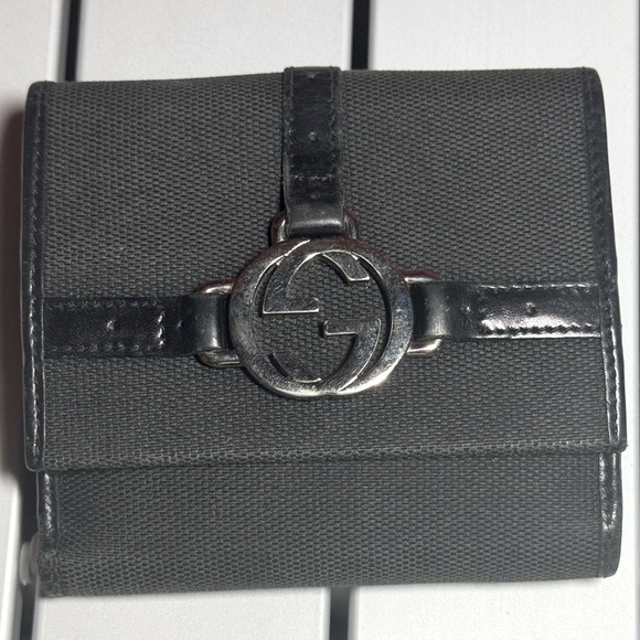 Black vintage cloth and leather Gucci bifold wallet. - Picture 1 of 13